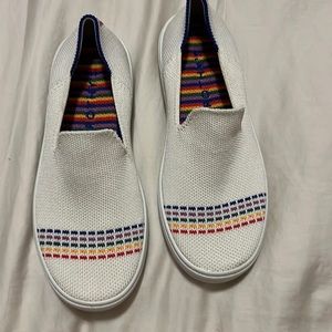 Girls Rothy’s slip one white with rainbow size 1. Excellent Condition.